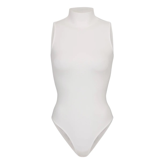 SKIMS Tops - Skims essential bodysuit size small-medium, very flattering. New with tags